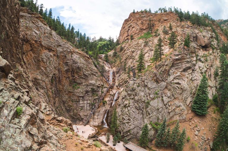 A Rocky Cliff With Trees