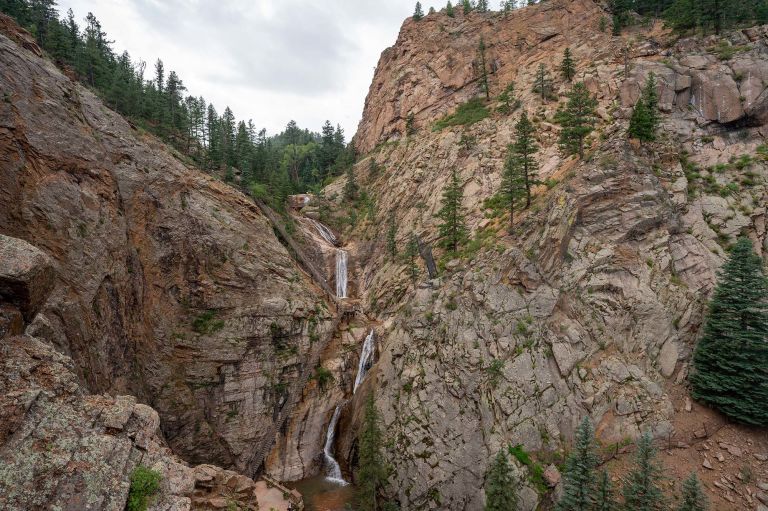 A Waterfall In A Rocky Area