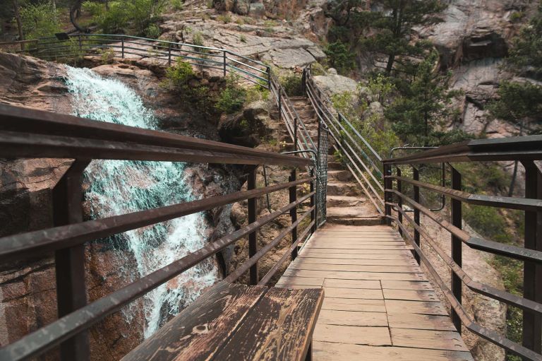 A Wooden Bridge Over A River