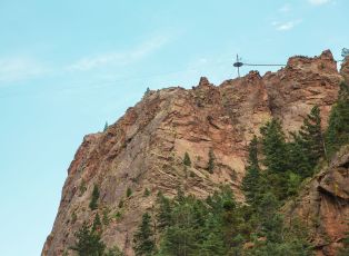 A Rocky Mountain With Trees