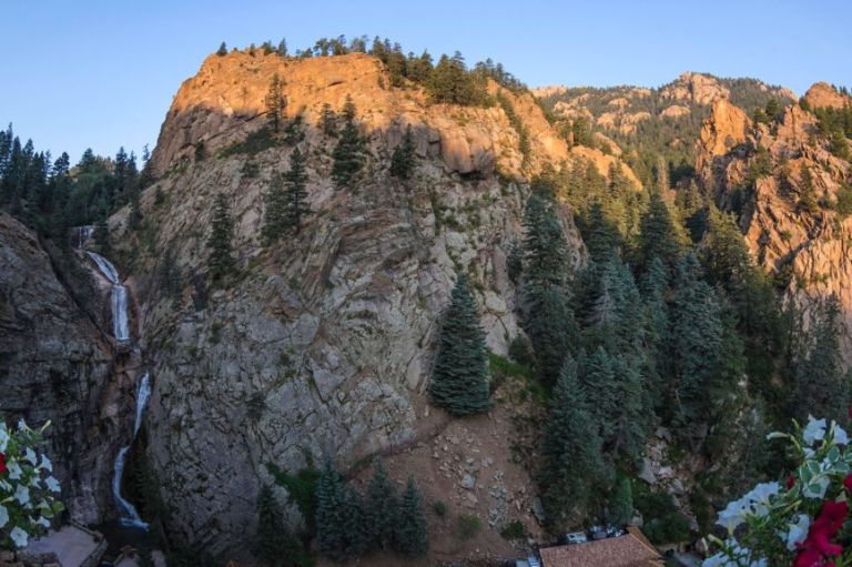 A Rocky Mountain With Trees