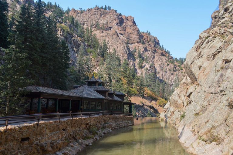 A House On A Cliff By A River